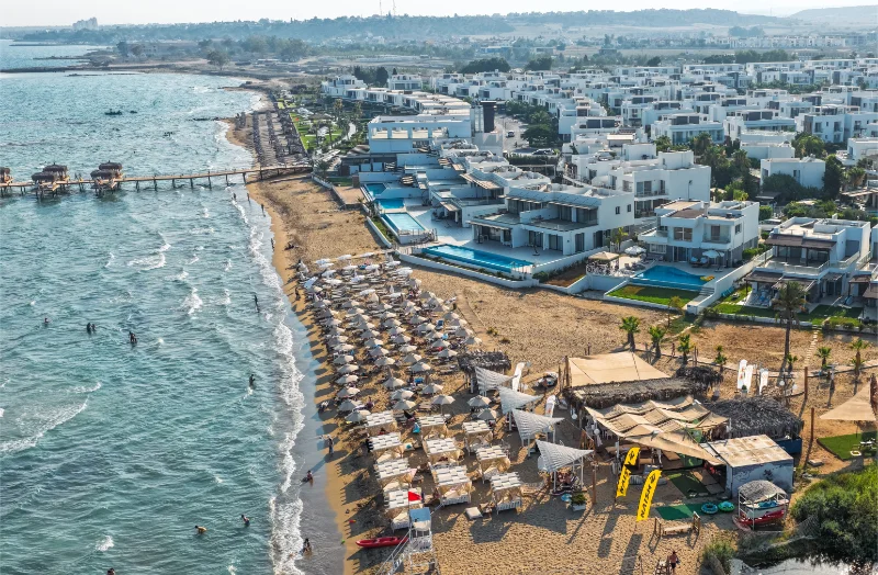 An aerial view of beach front villas touching the sands  of Mediterranean sea, Iskele North Cyprus