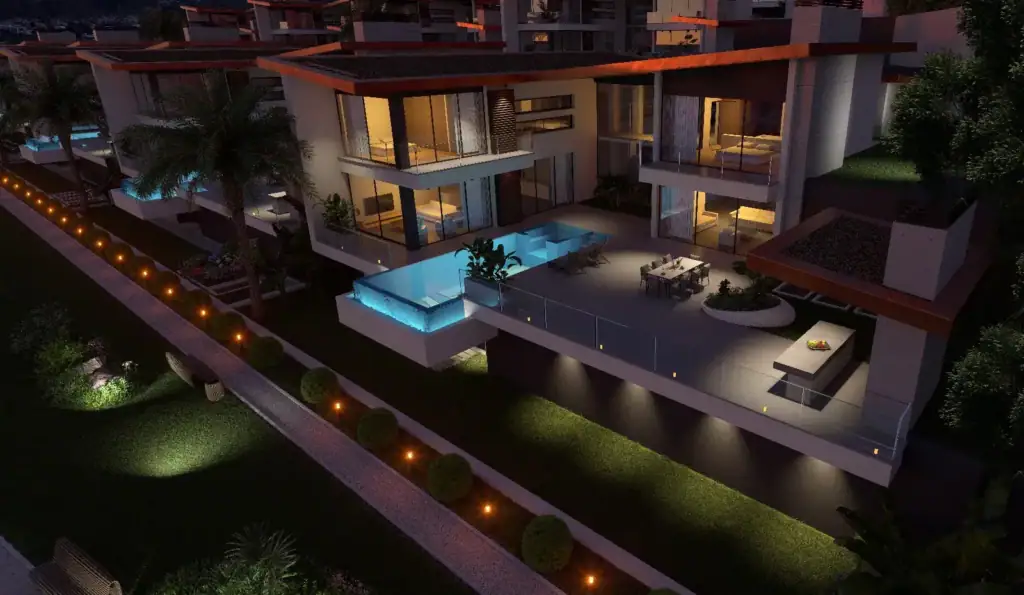 Elevated nighttime rendering of modern luxury villas featuring private illuminated pools, spacious terraces, and beautifully lit garden pathways.