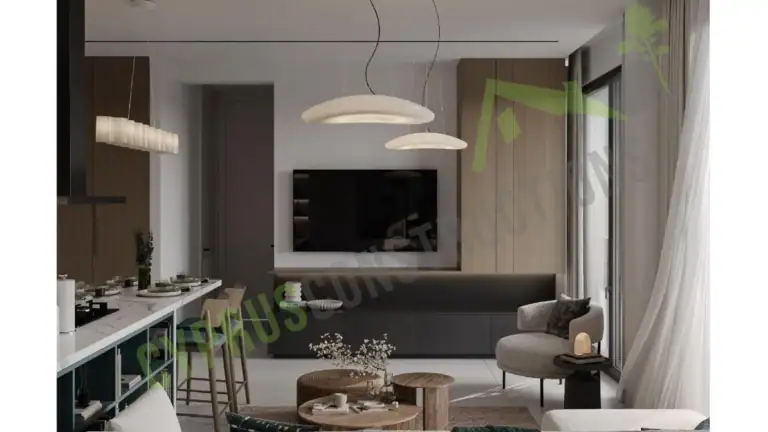 Bright and stylish living room featuring a large flat-screen TV, comfortable seating, and contemporary decor in North Cyprus.