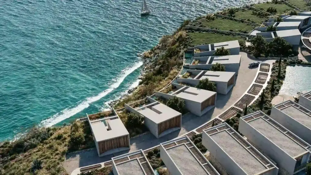 Seaside villas with modern design and private pools overlooking the Mediterranean coast in North Cyprus.