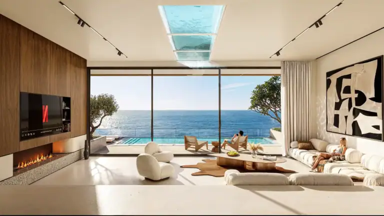 Spacious living room featuring large windows overlooking the Mediterranean Sea in North Cyprus. Elegant furniture and contemp.