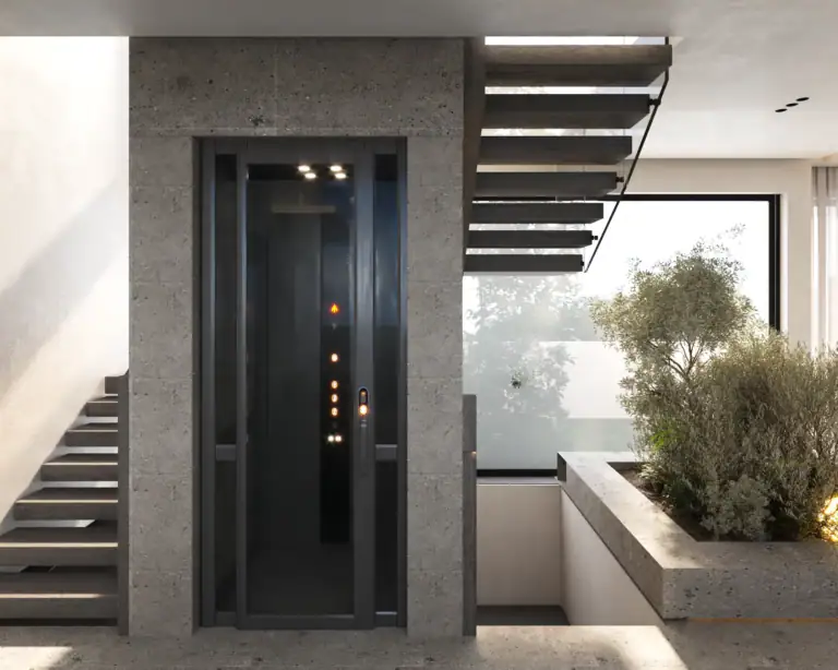 Sleek glass residential elevator integrated into a stone wall next to modern floating wooden stairs in a luxury home.