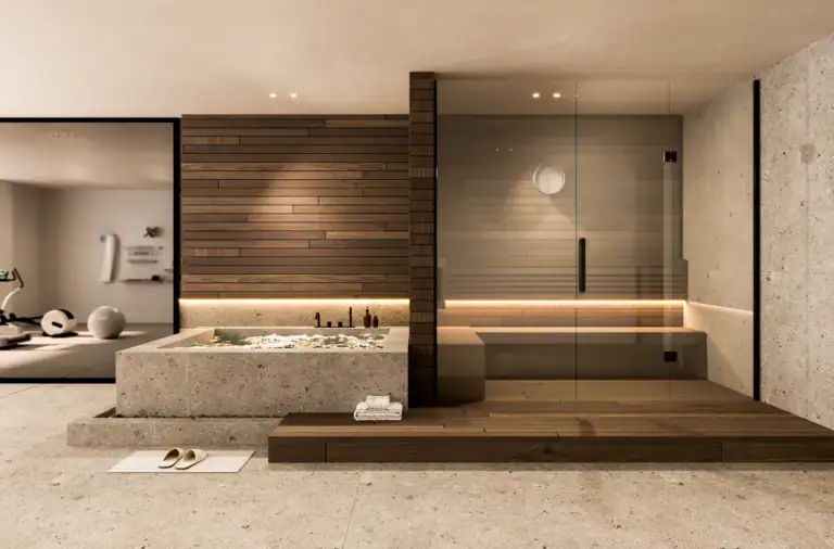 Luxurious modern home spa featuring a concrete plunge pool, a glass-enclosed wooden sauna, warm ambient lighting, and elegant stone flooring.
