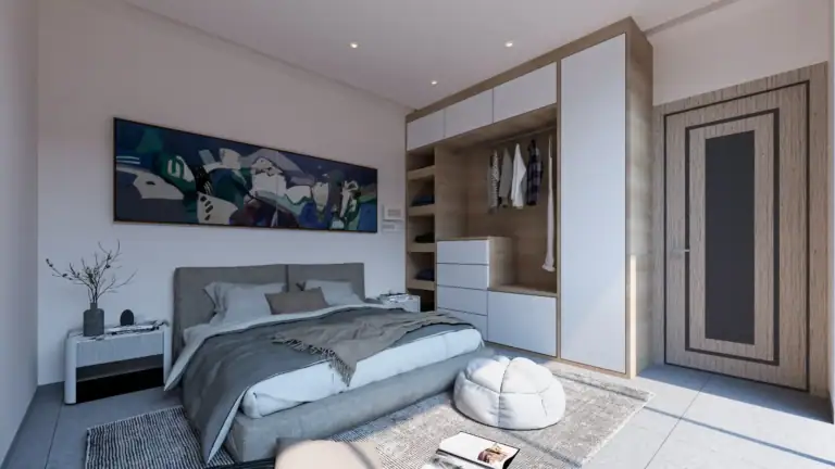 Spacious bedroom featuring a large bed, wardrobe, and contemporary design in a North Cyprus property.