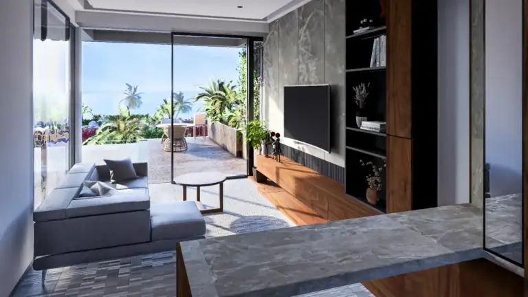 Spacious living room featuring a large glass door opening to a balcony with sea views, palm trees, and outdoor seating in Nor.